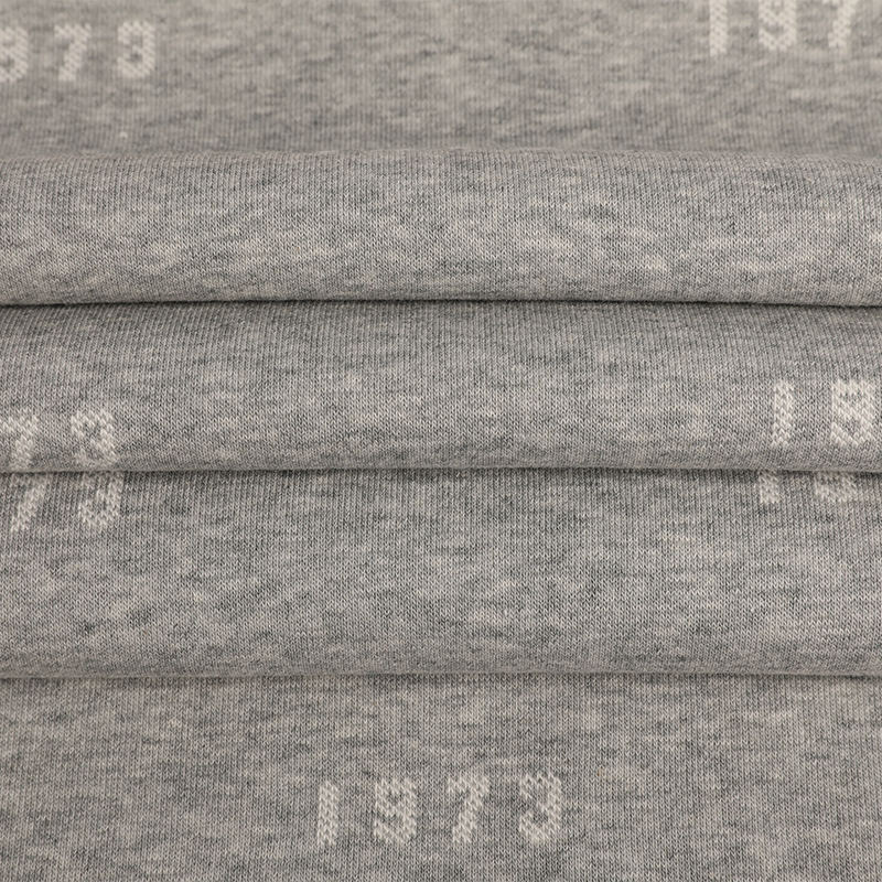 32s Celese + 100D/36F Recycled Polyester + 10s Celese Jacquard Fleece Tela